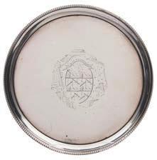 288 A George III silver waiter, maker Peter & Ann Bateman, London, 1795 crested, of plain circular from with reeded border, on three swept legs, 17.25cm. diameter, 7.54ozs.