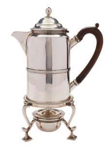 298 A late Victorian silver coffee pot, stand and burner, maker John & Frank Pairpoint, London, 1900 of plain cylindrical from with domed hinged lid and ball finial, raised on a circular