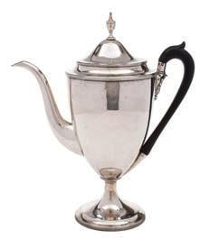 302 A Victorian silver teapot, maker Hirons, Plante & Co, Birmingham, 1870 crested, of oval outline with bright cut banded and foliate decoration, with shallow domed lid, 23cm. long, 12.