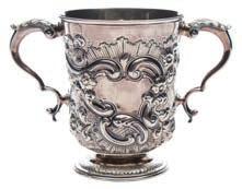 * 80-120 360 A Victorian silver wine ewer, maker Elkington & Co Ltd, Birmingham, 1887 the hinged domed lid with urn finial, the urn-shaped body with writhen reeded decoration on a spreading circular