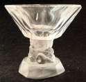 GL668a 467-2-1 GL820 3741 53-4-2 $18.00 CRYSTAL 2 3/4 D, 2 1/2 H 2 L, 1 3/4 W, 3/4 D HAS CHIP ON TOP EDGE. NICE BUT SMALL CHIPS 10 SIDED TOP POLISHED GLASS PEDESTAL.