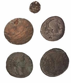 A total of nine Roman coins were recovered from the Posterholt-Achterste Voorst cemetery. Two coins were found in grave one, a Roman cremation grave. Another coin was found as a stray find.