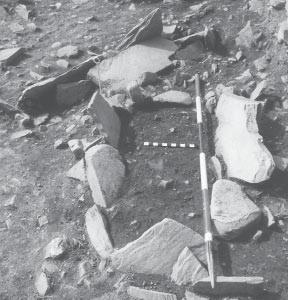 39 Fig. 28 - Grave S 16 from E. after excavation. Note grave S 22 cutting its head diagonally. partially crouched burial accompanied by grave goods.