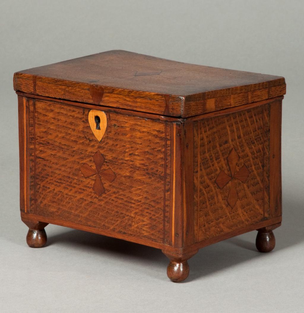13 Miniature chest of drawers 650 Cist ddroriau fechan A very pretty miniature Welsh chest of drawers which is made from a variety of woods, including oak, pine, mahogany, bog-oak and sycamore, also