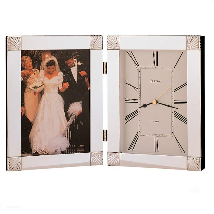B1254 CEREMONIAL. Chrome finish metal case. 5 inch x 7 inch photograph opening. Protective glass lens.