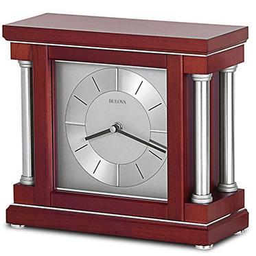 Polished pewter-finish components, inlaid accents and raised hour markers.