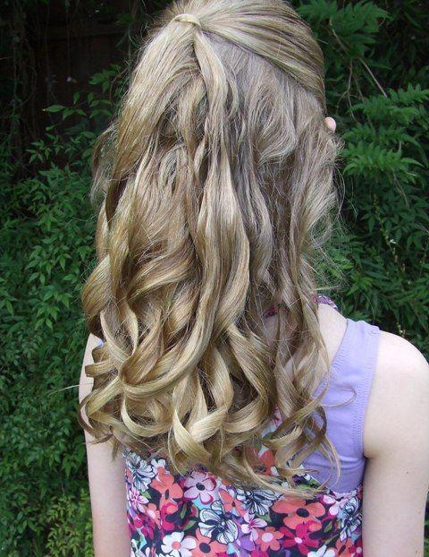 Susan Waverly For hair, just have your hair pulled half back with a red ribbon or bow.