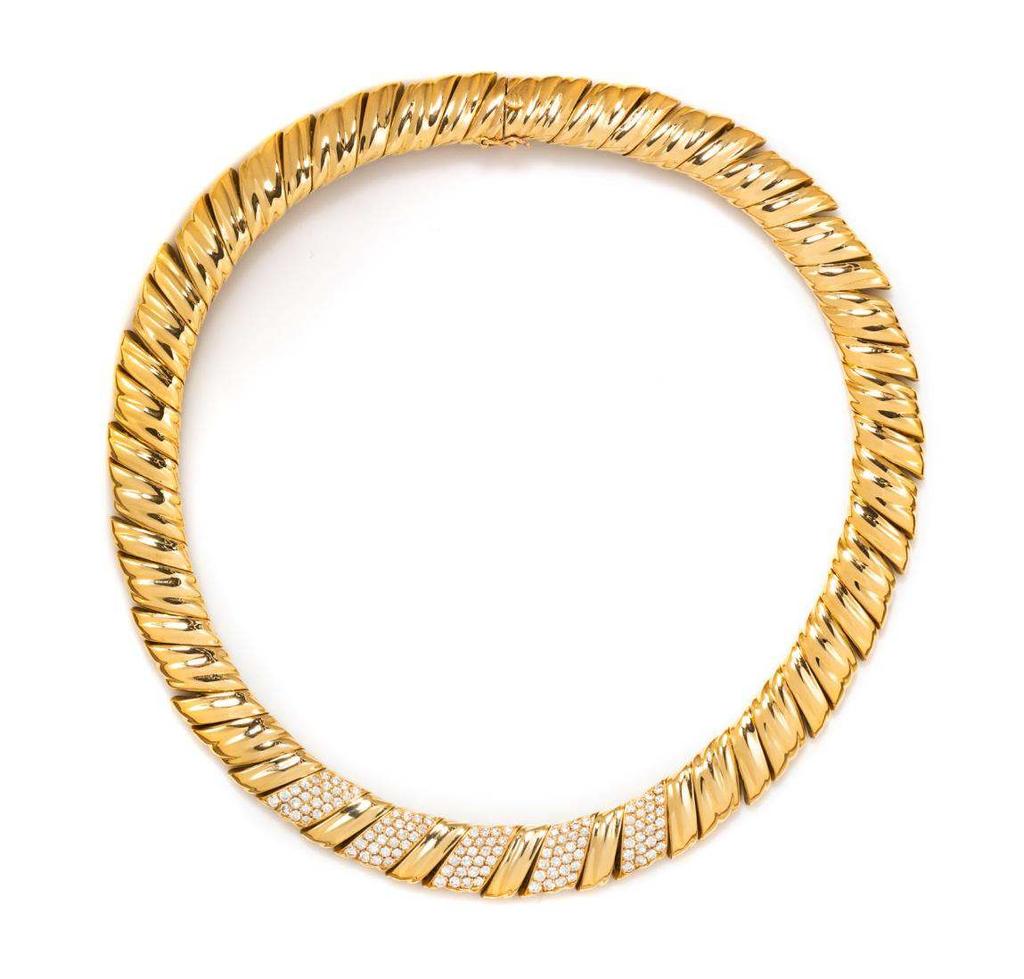 Sale 394 Lot 256 An 18 Karat Yellow Gold and Diamond Collar Necklace, Van Cleef & Arpels, in a diagonal fluted link design, five front links pave set with 120 round brilliant cut diamonds