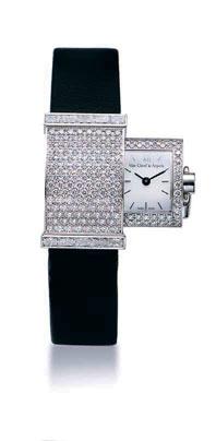 2111 (OPENED) (CLOSED) 2111 VAN CLEEF&ARPELS A LADY'S WHITE GOLD AND DIAMOND-SET WRISTWATCH WITH HIDDEN