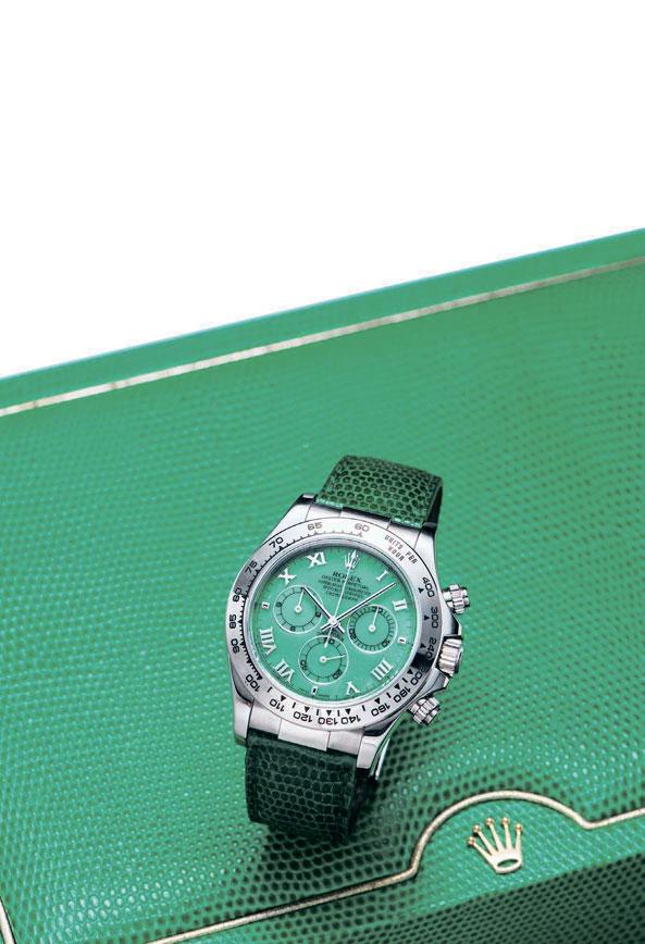 2119 ROLEX A FINE, WHITE GOLD AUTOMATIC CHRONOGRAPH WRISTWATCH WITH GREEN CHALCEDONY DIAL CIRCA 2000 Cal 4130, 44 jewels, green chalcedony dial, applied Roman numerals, 3 subsidiary dials for