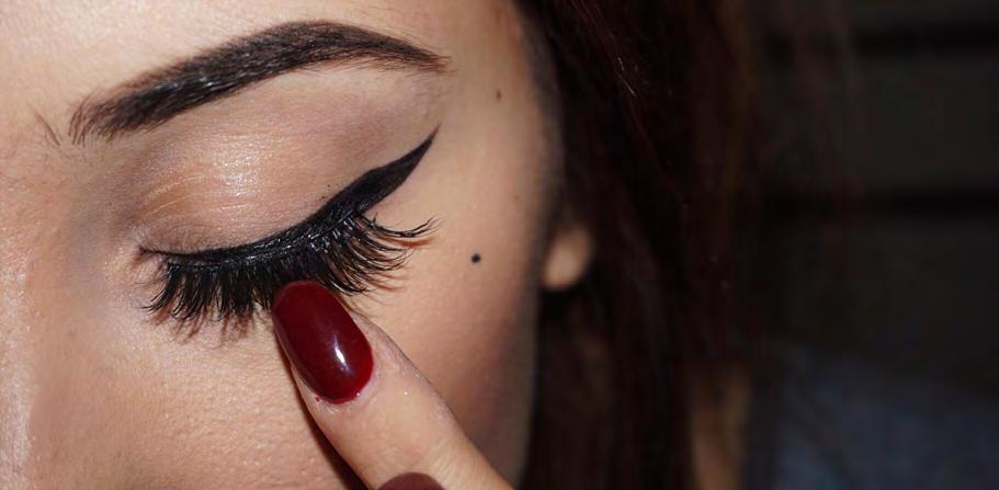 5 winged cat eyeliner Next add her signature beauty mark next to her left eye and pop on your lashes.