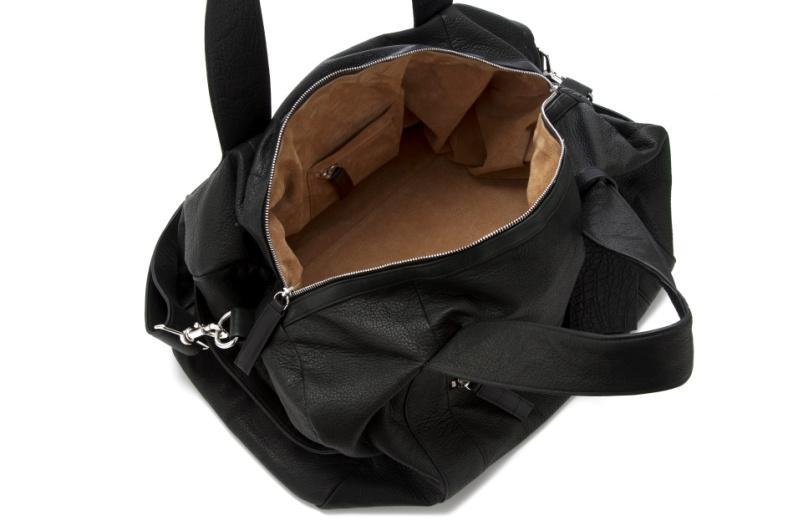 Large Weekender Duffle Bag Construction: One exterior zip pocket on front large enough to fit a tablet.