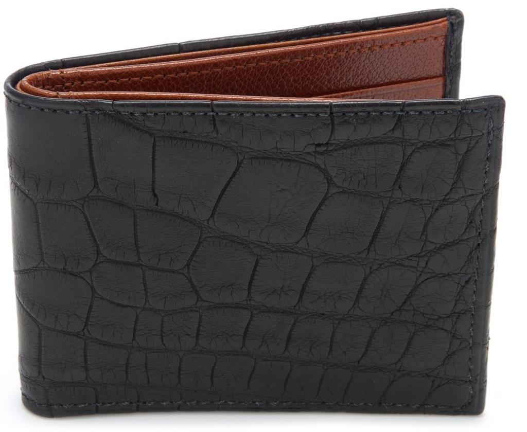 Genuine Alligator Slimfold Wallet Material: Genuine American alligator with a light luster Interior: French calfskin Dimensions: 4.375 W x 3.