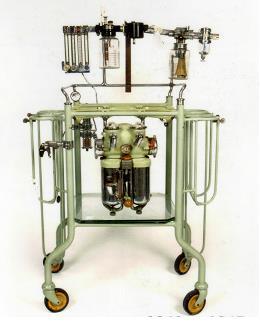 A typical 1950s anaesthetic machine had only cylinders of gas, including.