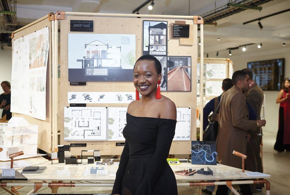above Graduate Beauty Nyembo Nkulu proudly presenting her work at the end of year exhibition.