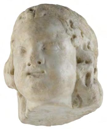 03 PUTTO HEAD Palazzo Poli ollection White marble head of a chubby-faced putto.