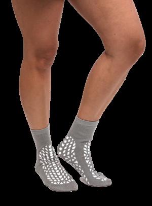 APPAREL PATIENT SOCKS - TREAD Excellent for fall prevention management Skid/slip resistant double tread Soft terrycloth provides warmth while absorbing perspiration Slippers provide patient comfort