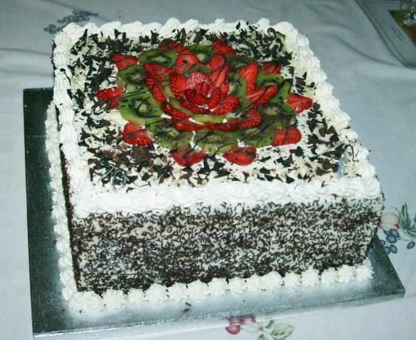 Prize number 9 A three layered chocolate cake round or square - filled with fresh Chantilly cream and fruit (optional), topped with chocolate shavings and fresh strawberries. To feed 12-15 people.