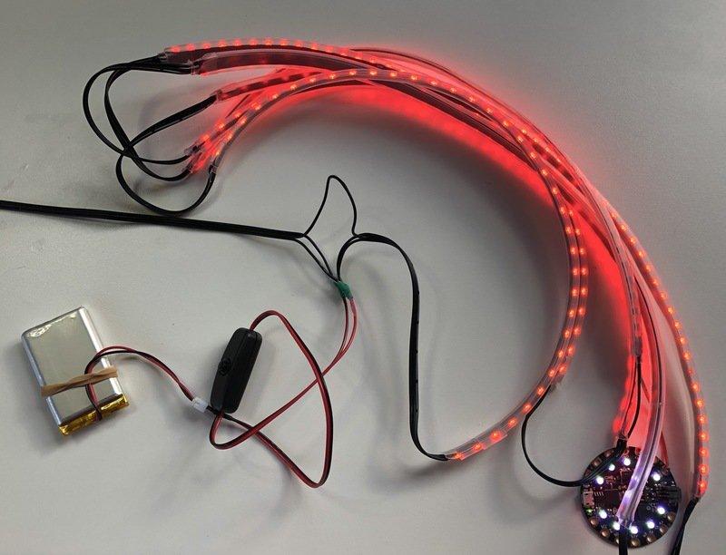 Solder the red wire to the striped wire connection point and the black wire to the