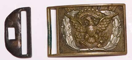 The classic spread-winged Eagle plate with cast brass wreath surrounding the eagle. Excellent condition with crisp detail and attractive light age patina.