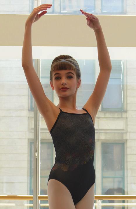 This ballet cut camisole leotard features an eye-catching floral motif gracefully sweeping across the bodice diagonally over