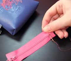 Measure the opening of your little purse, and trim the zipper to size.