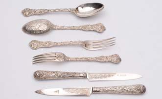- W. C., probably T & W Chawner (see Grimwade pg. 270 - No, 2816) and seven other Hanoverian and Old English pattern table spoons, some wear to the marks, total weight 20.5ozs (11). 140-180 47.