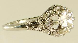 $15 - $30 Two sterling silver Viking Ship-form knife rests. George Jensen sterling silver handle sheers. Set of six George Jensen sterling silver tea spoons.