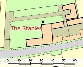 Test Pit five (WAL/13/5) Test pit five was excavated on a grassed area immediately north of a converted Grade II listed early 18 th century barn to the west of Thorpe View (The Stables, The Street,