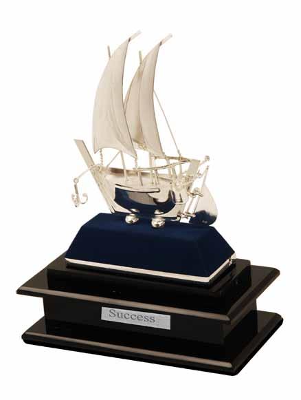 From engraved plaques, to pens, silver dhows, and prize trophies, our display cases