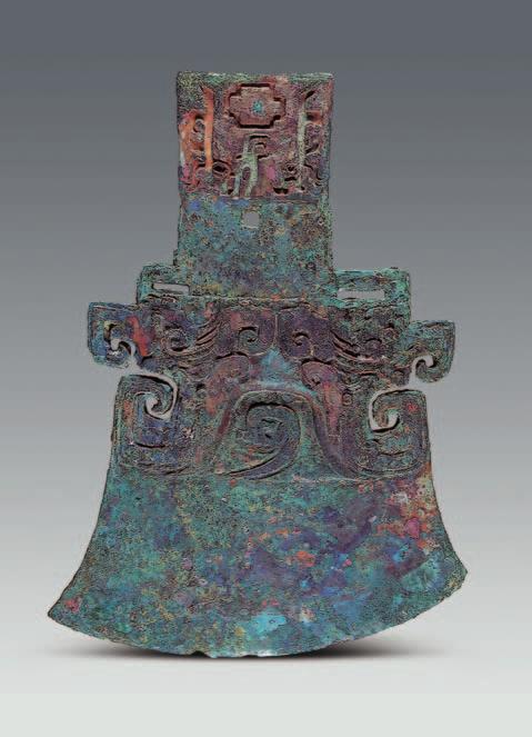 Fig. 15 Bronze yue-axe (M54:86) downward, inside of which is a kui-dragon motif. On each side of the dragon mouth is a kui-dragon inside of which is a small dragon motif.