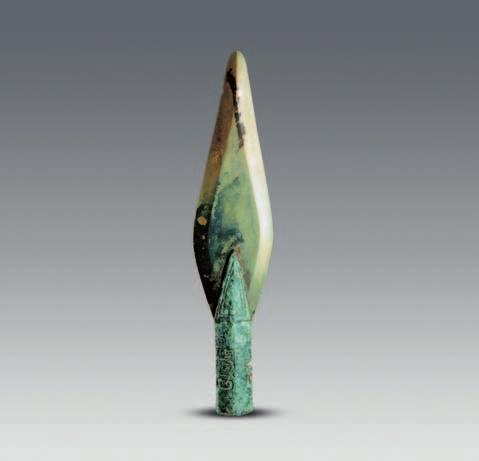 The object is completely decorated with pieces of turquoise; it measures 37.2 cm long (Fig. 14:5). Hand-shaped object. M54:392 is likely a right hand with five slightly stretching fingers.