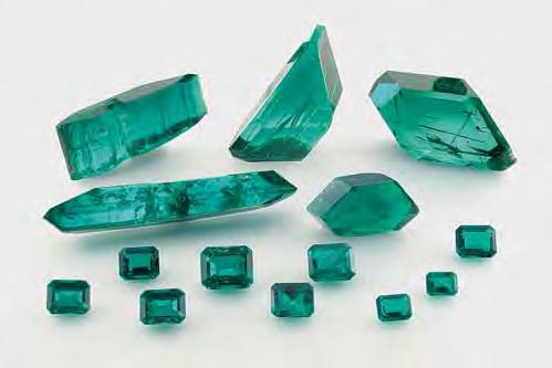 Figure 1. Malossi synthetic emeralds are grown by a hydrothermal technique in the Czech Republic, using Italian technology. These crystals (28.40 141.65 ct and 7.1 69.9 mm) and emerald cuts (1.34 7.