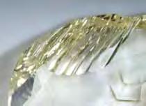 Figure 10. These facets, intended to represent the eagle s feathers, were cut by hand with a tool made expressly for this diamond. Magnified 8. is not suitable for traditional shapes and proportions.