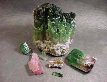 Figure 23. Most of the tourmaline in the pocket was green, although bicolored crystals were common and a limited amount of pink material (some showing chatoyancy) was recovered.