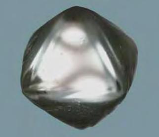 Figure 30. At first glance, this 1.53 ct rounded octahedron has the appearance of a rough diamond crystal.