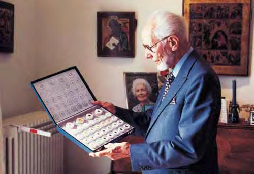 Figure 1. The pioneering Swiss gemologist Edward J. Gübelin (1913 2005) looks at a set of gems from his personal collection, which contains more than 5,000 specimens.