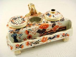 Lot # 408 408 "Old Japan" pattern inkstand. $200 - $400 Lot # 409 409 two handled vase with pierced cover, ht. 15 1/2". 250 Three Continental silver apostle spoons.