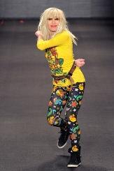 Now picture her in a vintage, flowery, tiny print dress with ruffles, or in a mod retro 60's mini dress. Now picture fashion designer Betsey Johnson - wild, creative and funky.