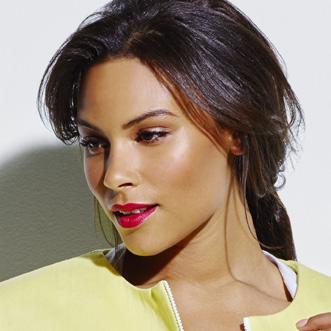 A pop of bright color against bronzy skin is the perfect update to try for