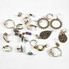 stones, tapered band set with five rectangular cut coloured stones & a small vintage marcasite set ring, some stones missing, various sizes, stamped, tested or h/m (1.