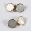 8g) Lot: 37 Pair of vintage cufflinks, comprising hexagonal mother of pearl set in yellow gold with narrow engine turned
