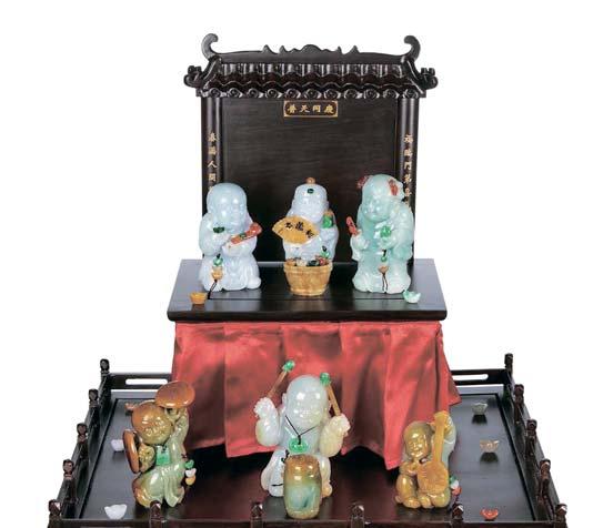 2673 2673 A GROUP OF JADEITE CARVINGS Accompanied by report no.