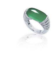 2676 2677 2676 A JADEITE AND DIAMOND RING Set with a thick jadeite plaque measuring approximately 17.72 x 8.37 x 6.