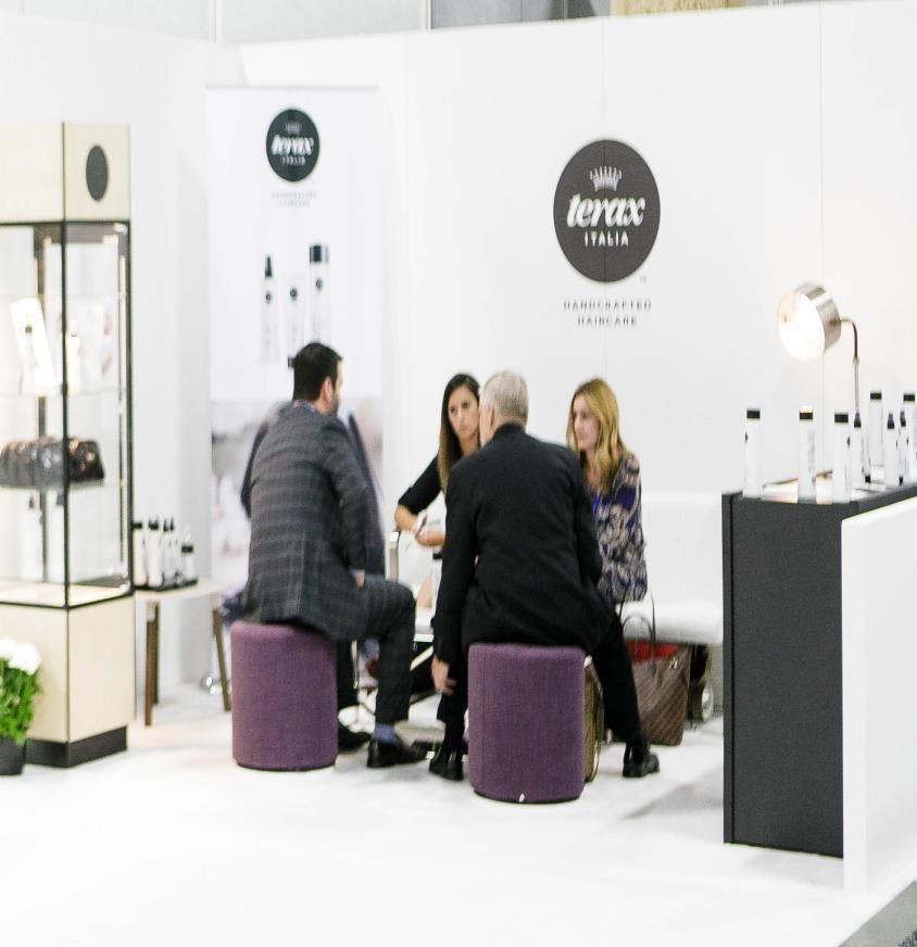 HOW IS IT IMPLEMENTED? DISCOVER PRO BEAUTY EXHIBIT SPACE : It all starts out with a special dedicated show floor area. Signage and special floor markers are posted to draw visitors to this area.