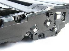 2) Lever and slightly push end-plate away from cartridge body. Use screwdriver in a variety of different places to ease end plate off.