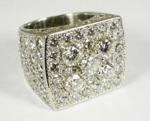 50tcw with consignors  $10,000 - $12,500 416 Pair of 18k white gold diamond and