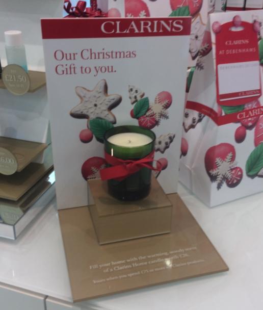 Clarins GWP 1. Scented Candle, worth 26 2. Free candle when you spend 75 or more on Clarins products 3. Very visible as you walk up to the Clarins stand.