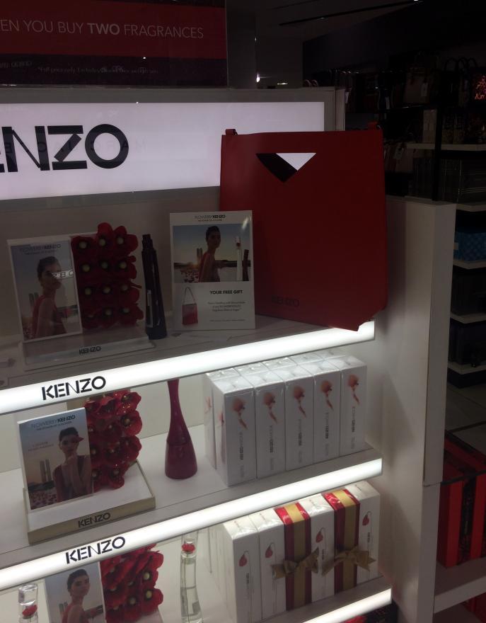 Very large and impactful gift positioned on the top shelf of the Kenzo bay