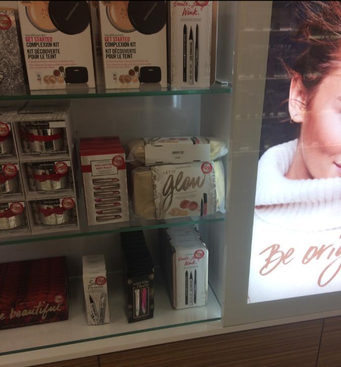 Not immediately visible - presented within wall of Bare Minerals